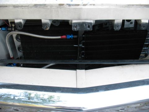 1985 Ford LTD Crown Victoria - The vehicle's front end shows an aftermarket oil cooler installed in front of the main radiator.