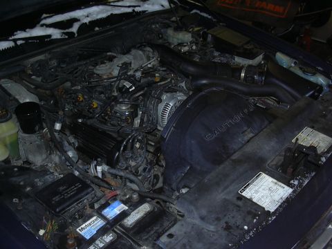 1996 Ford Crown Victoria - Engine bay components including battery, air intake, and fan shroud are visible in this photo.