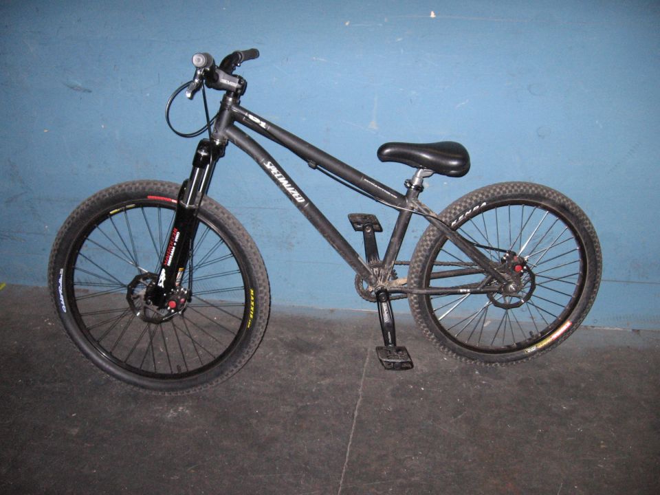 Black Specialized mountain bike, side view