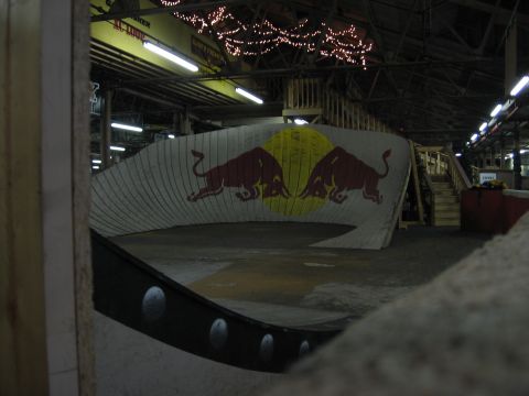 1997 Ford Probe - Indoor skate ramp structure the Red Bull logo. Supermotors.net watermark is visible.