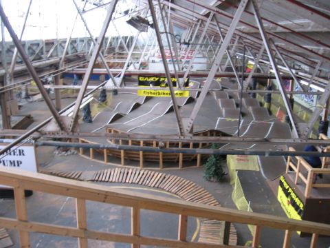 1997 Ford Probe - An indoor bike park features a complex layout of ramps and jumps designed for cycling enthusiasts.