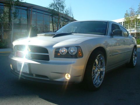 2006 Dodge Charger - A silver 2006 Dodge Charger is shown from a three-quarter front angle, custom modifications.