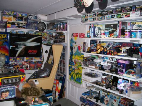 1966 Pontiac Fiero - A room packed with Star Trek merchandise, models, toys, and posters, along with a unique arcade seat.