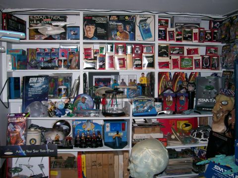 1966 Pontiac Fiero - A collection of Star Trek merchandise is displayed on shelves.