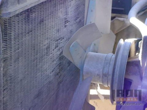 1966 Ford F-250 - Close-up view of the engine fan and radiator assembly on a 1966 Ford F-250.