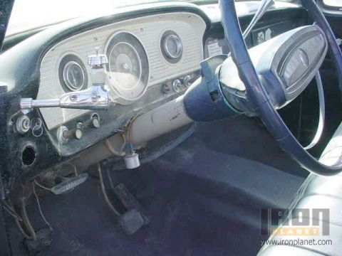 1966 Ford F-250 - Interior view of a 1966 Ford F-250 truck, highlighting the dashboard and steering column.