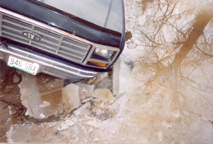 1982 Ford Bronco - Ford Bronco front end stuck in a muddy, icy ditch.