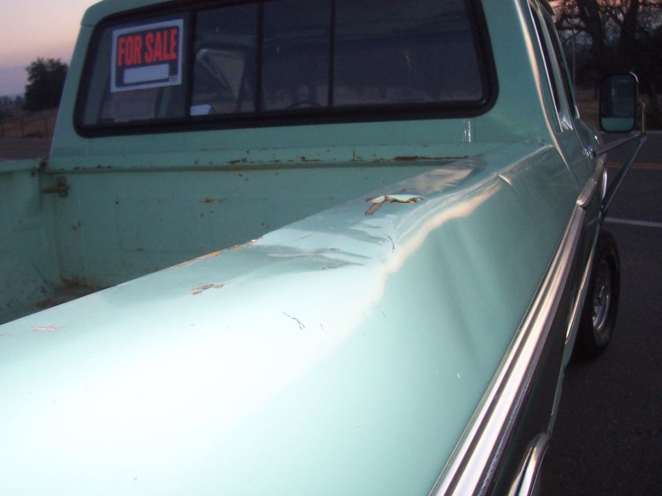 right side of bed. Notice dents on side and on top of bed rail