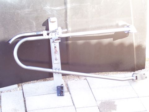 1991 Ford Bronco - A metal step bar assembly is shown, likely for a truck or SUV, mounted against a dark background.