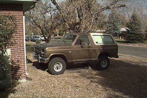 1980 Ford Bronco - This 1980 Ford Bronco is parked in a driveway on a sunny day.
