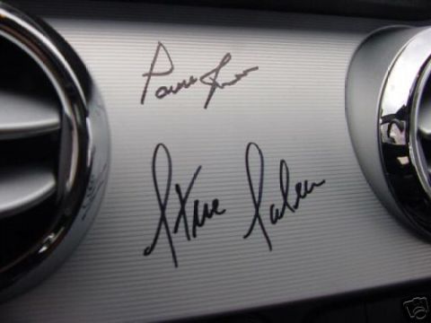 2007 Saleen S-302 - Close-up of dashboard trim two handwritten signatures and chrome accents.