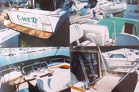 1982 Ford Bronco - A boat named C-WE'D is docked in a marina, with other vessels nearby.