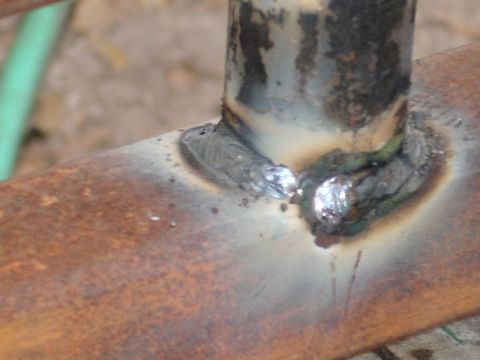 1989 Ford Bronco - Close-up of a welded metal joint on a rusty frame, with a SuperMotors.net watermark visible.
