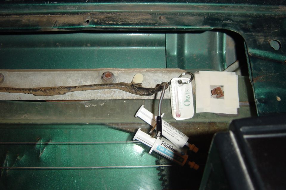 Area where tab will be epoxied is masked off, warmed up and ready for repair.