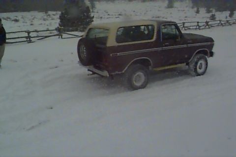 1980 Ford Bronco - This 1980 Ford Bronco is seen in a snowy environment, viewed from the rear three-quarter angle.