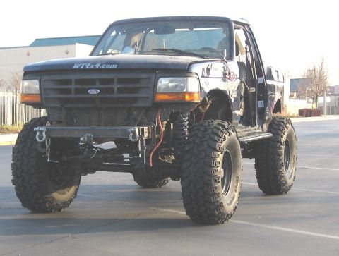 1994 Ford Bronco - This heavily modified Ford Bronco features massive off-road tires and a custom front end.