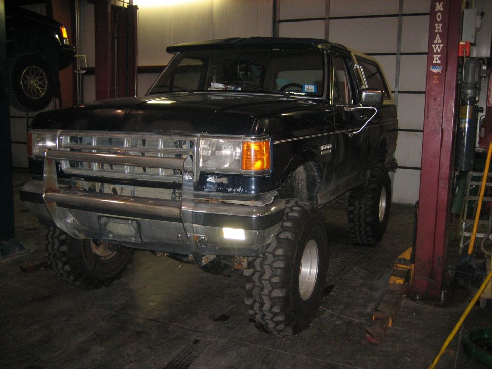 1990 Ford Bronco on a lift, front view
