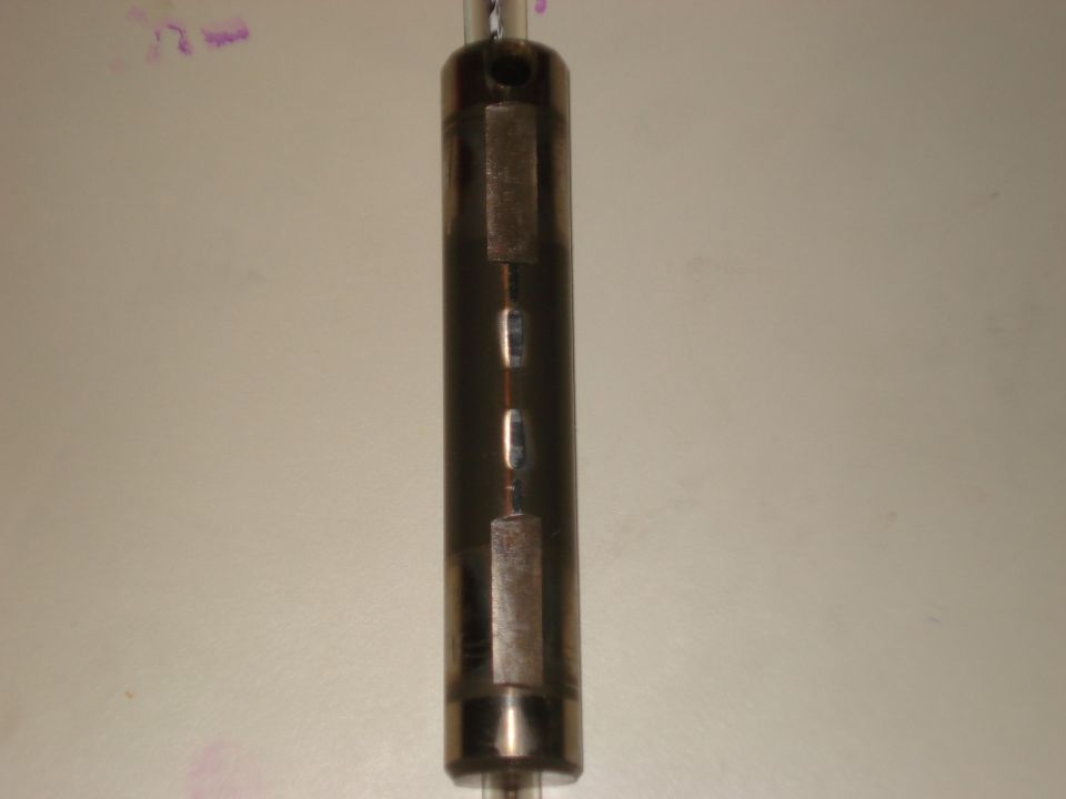 driveshaft U-joint with rectangular metal caps