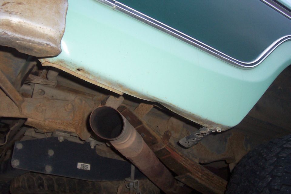 under right rear corner