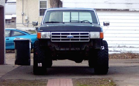 1988 Ford F-250 - Front view of a Ford F-Series truck, likely from the late 1980s, missing its bumper.