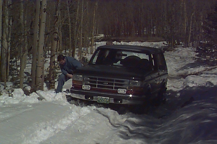 This is BroncoBob's truck. Boss74 is helping Bob dig it out after getting stuck all the way up to the frame.
I think he took more pics, so you'll have to see his page for them.