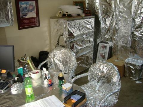 1991 Ford Bronco - An office space is covered in aluminum foil, creating a unique and reflective environment.