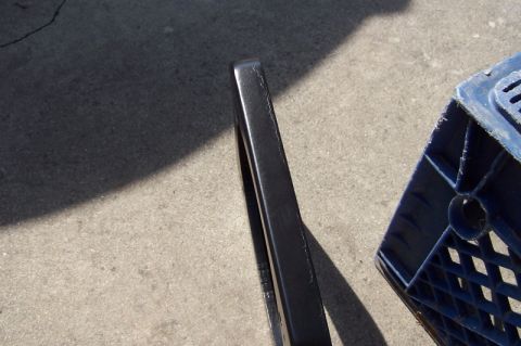 1990 Ford Bronco - A close-up view of a speaker adapter and a blue plastic crate.