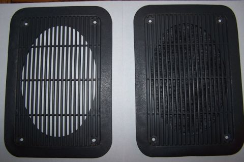 1990 Ford Bronco - Two speaker grilles are shown, one with a white backing and the other with a speaker behind the grille.
