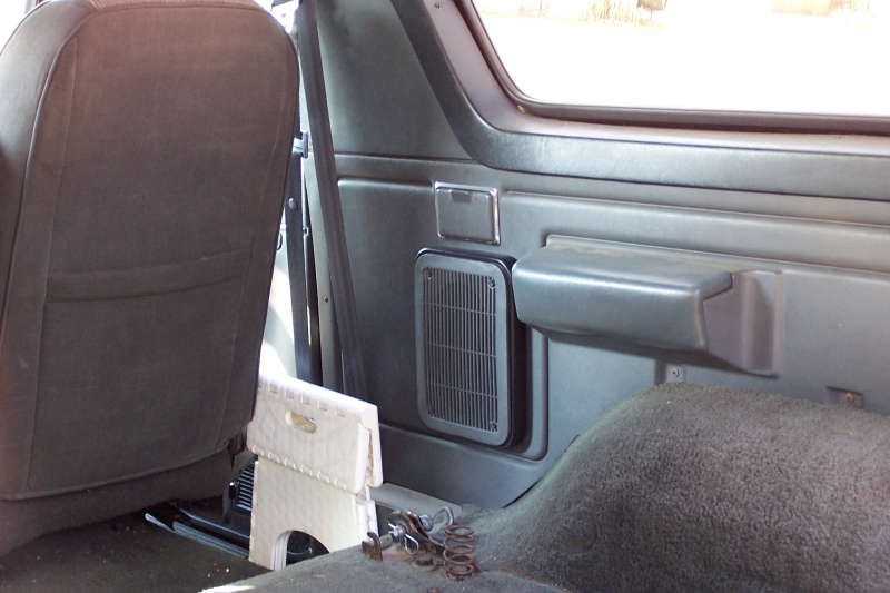 Interior speaker grille and rear seat of a 1990 Ford Bronco