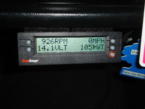 1992 Ford Crown Victoria - A ScanGauge displays vehicle data including engine speed, voltage, and speed.