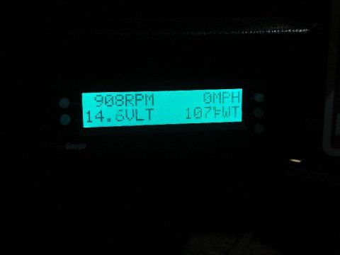 1992 Ford Crown Victoria - A digital dashboard display shows engine RPM, voltage, speed, and temperature readings.