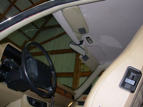 1992 Jaguar XJ-S - The interior of a 1992 Jaguar XJ-S is visible, including the steering wheel and dashboard.