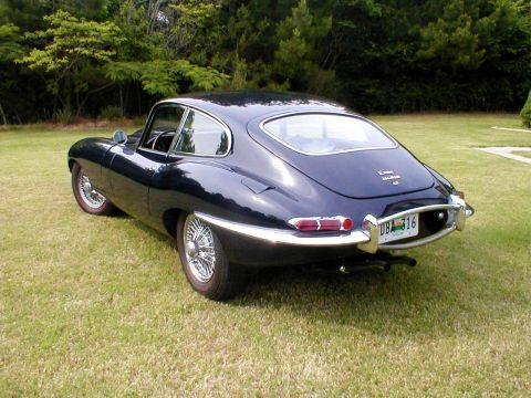 1967 Jaguar XKE - This 1967 Jaguar XKE coupe features a classic fastback design and wire wheels, seen here from a rear three-quarter perspective.