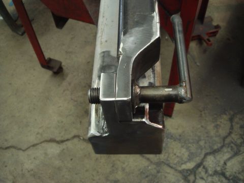 1996 Ford Bronco - A metal vise with a threaded screw and a lever handle is shown in detail.