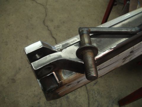 1996 Ford Bronco - Fabrication of a custom rear bumper component, showing welded metal and a bolted assembly.