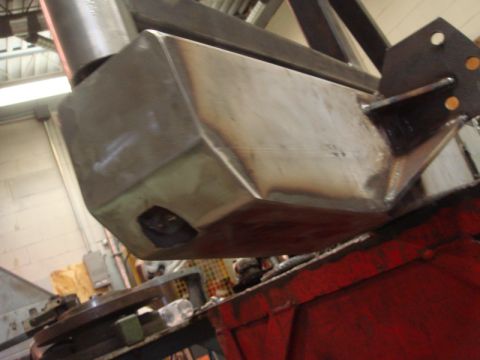 1996 Ford Bronco - Fabricated metal rear bumper with welded seams and a cut-out, likely for a custom build.
