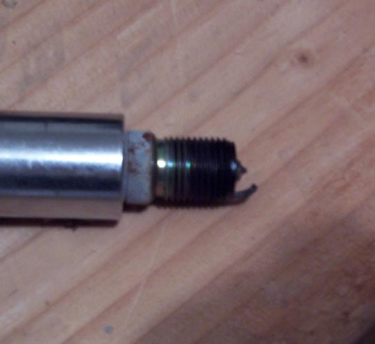 an NGK PTR4B-15. it is the sparkplug out of cylinder #5 not #6