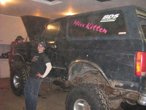 1995 Ford Bronco - Modified 1995 Ford Bronco with custom decals and large tires.