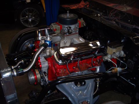 1984 Ford Bronco - This is a close-up view of a modified V8 engine, likely undergoing restoration or customization.