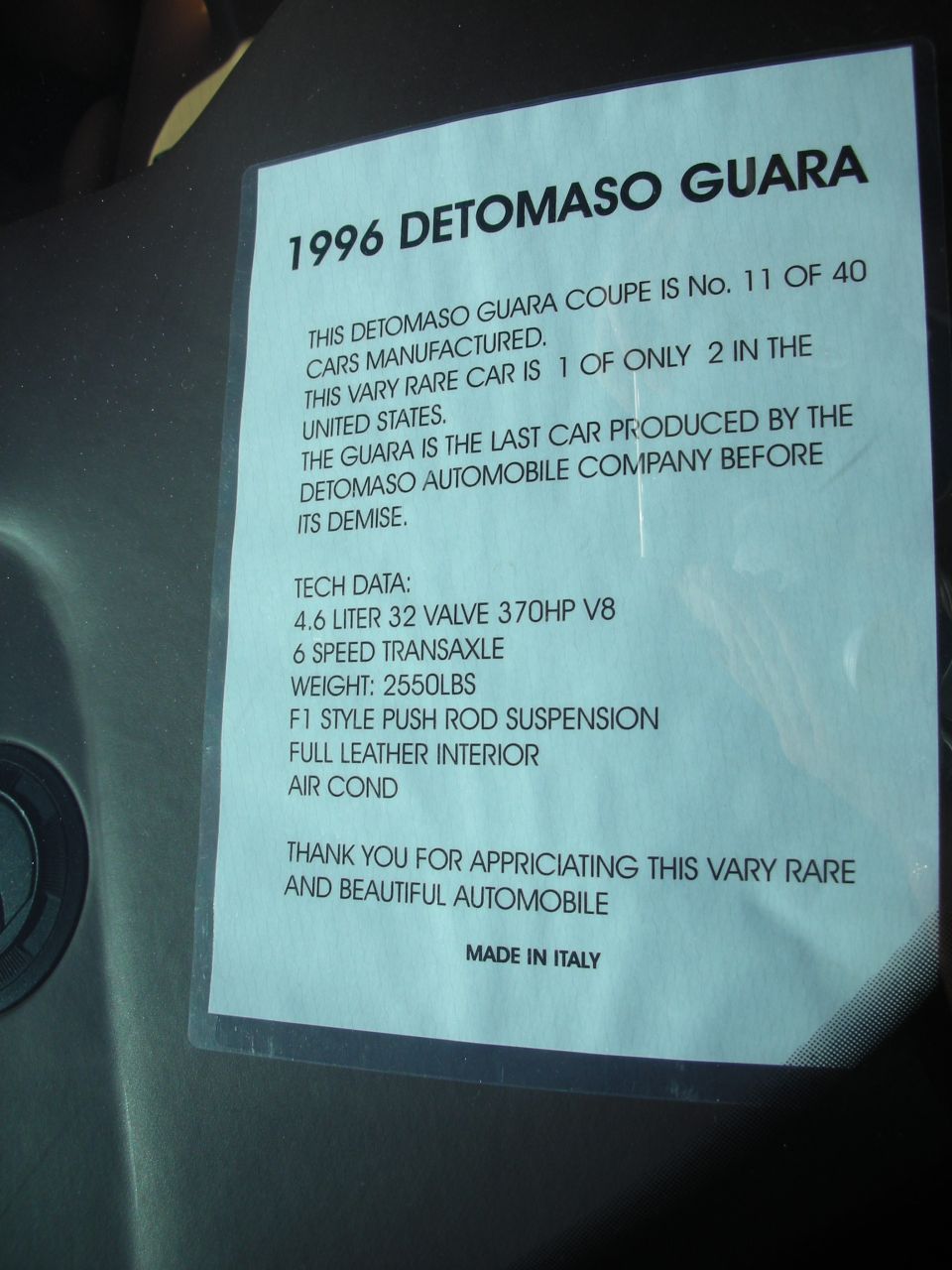 1996 DeTomaso Guara display card listing tech data: 4.6L V8, 6-speed, 2550 lbs