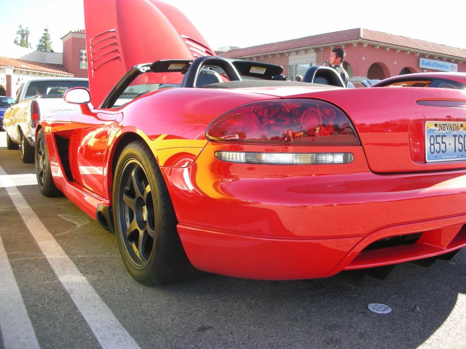 Rear quarter of a red Dodge Viper convertible with Nevada plate