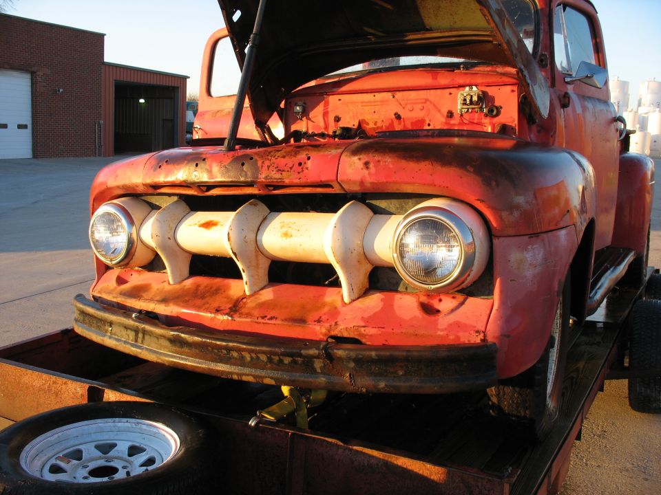 1952 Ford Pickup front view, hood open, red paint, on trailer