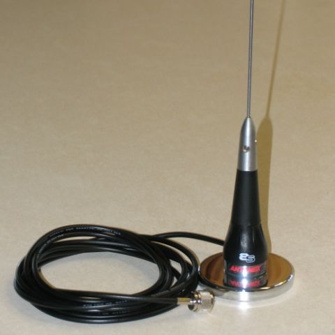 1984 Ford Bronco - A car antenna with a coiled cable and chrome base is shown against a neutral background.