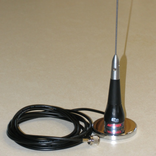 Black and silver car antenna with coiled black cable and chrome base