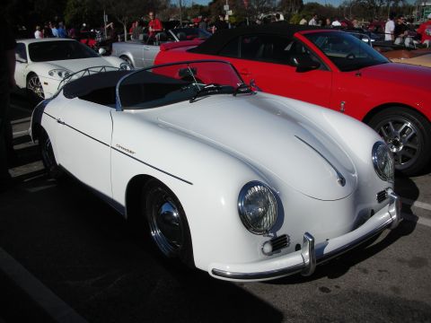 1998 Ford Crown Victoria - white Porsche 356 Speedster-style roadster with chrome bumpers and a low windscreen parked at a busy car show.