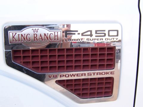 2000 Ford Excursion - Close-up of the F-450 King Ranch Lariat Super Duty V8 Power Stroke badge.