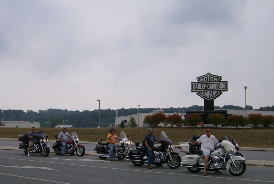 Motorcycles parked with Harley-Davidson sign