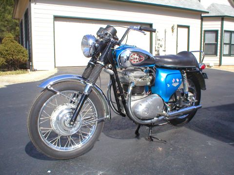 1968 BSA Lightning - This 1968 BSA Lightning motorcycle features a bright blue fuel tank with chrome accents and a prominent '384' badge.