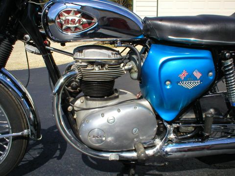 1968 BSA Lightning - Close-up of a 1968 BSA Lightning 650 motorcycle, highlighting its engine and distinctive blue side cover.