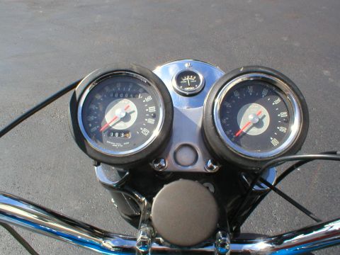 1968 BSA Lightning - Close-up of motorcycle gauges, including speedometer, tachometer, and fuel level indicator.